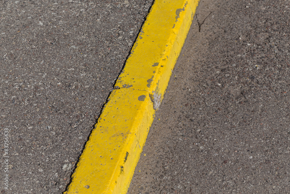 Yellow curb stone border
