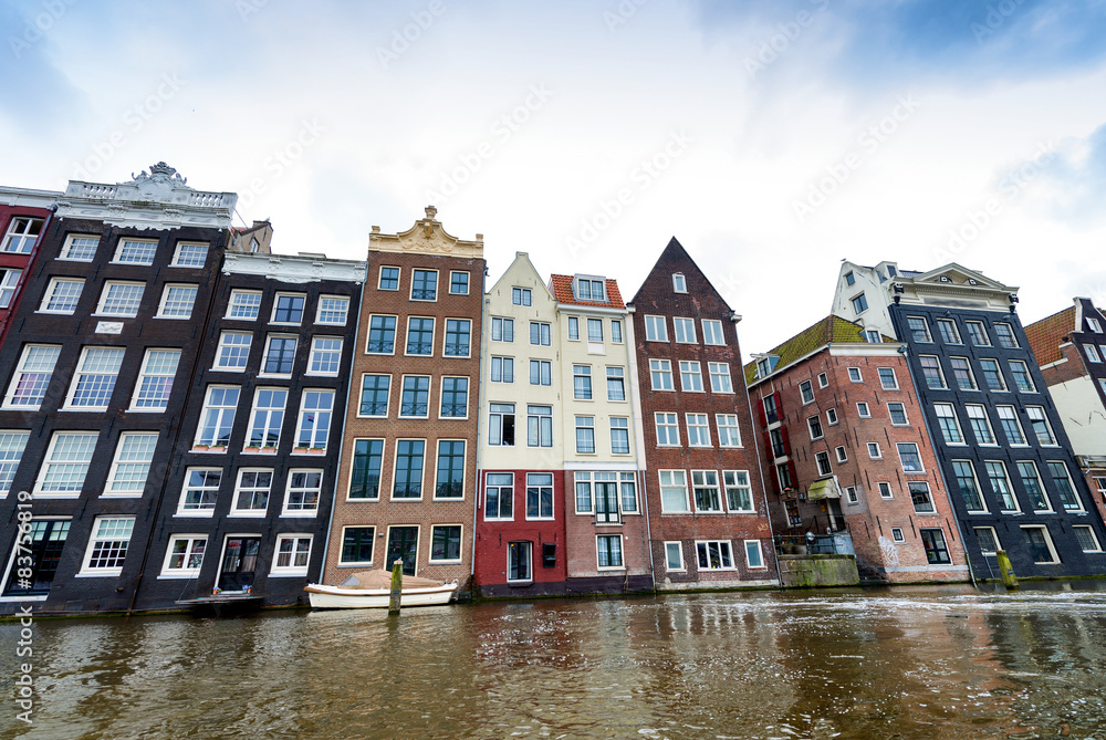 Beautiful view of Amsterdam with typical dutch houses. Holland