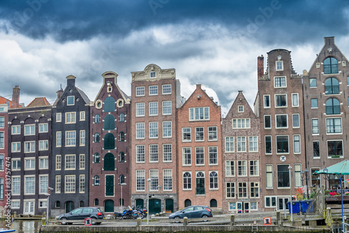 Beautiful houses of Amsterdam along city canal © jovannig