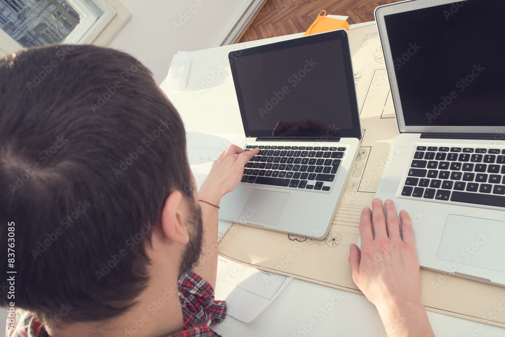 Architect going for a combo usage of laptops. Architect going for a combo usage of laptops.