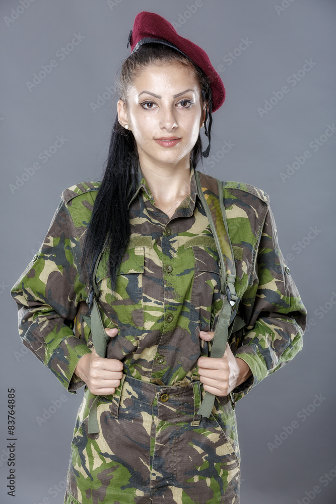 portrait of a woman soldier with backpack portrait of a woman soldier with backpack