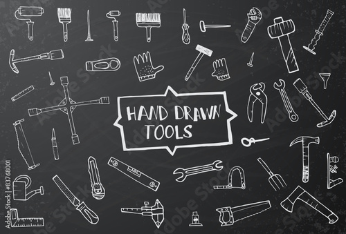 Hand drawn tool icons set on black chalk board