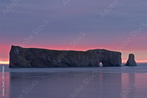 Early sunrise at Perce Rock in Gaspe, Quebec photo