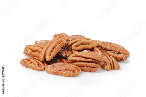 Canvas Print Pecan halves isolated on a white
