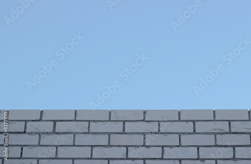 Brick wall and sky