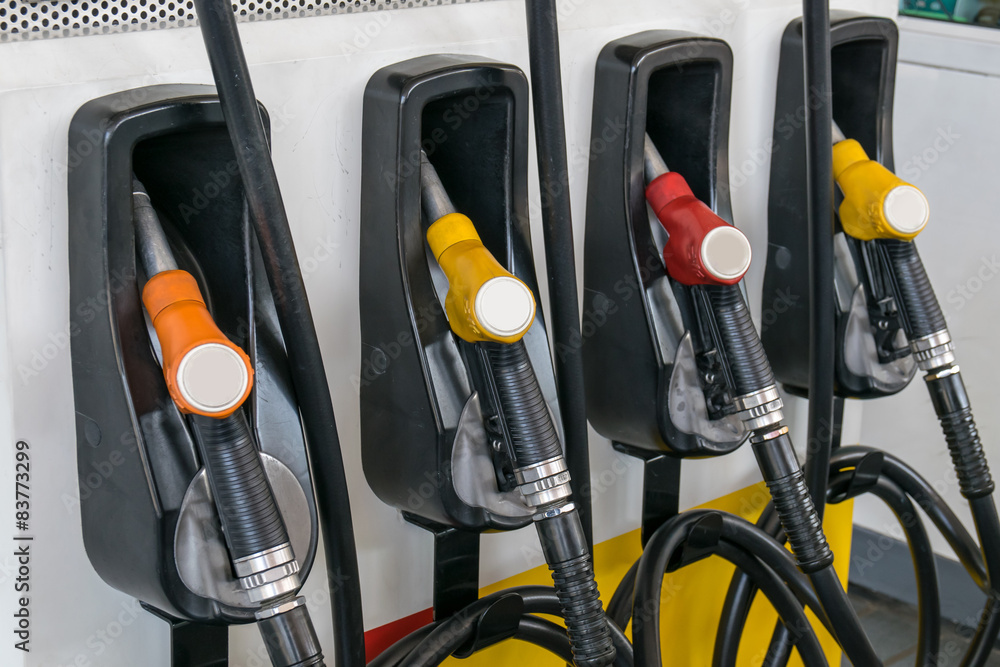 Pump nozzles at the gas station Pump nozzles at the gas station
