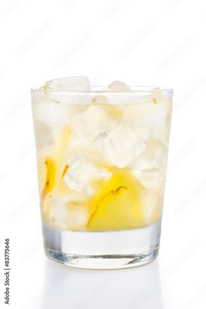 Refreshing ice cold ginger tea in transparent glass Refreshing ice cold ginger tea in transparent glass