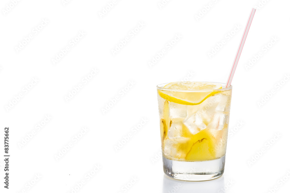 Refreshing ice cold ginger lemon tea in transparent glass Refreshing ice cold ginger lemon tea in transparent glass