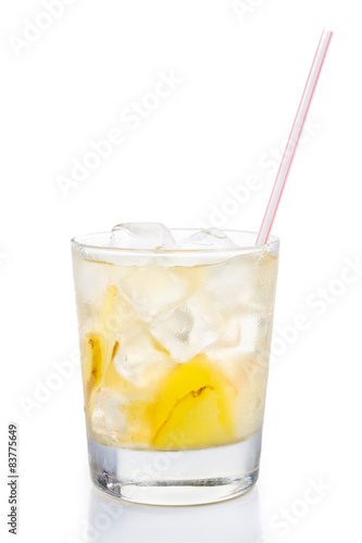 Refreshing ice cold ginger tea in  glass on vertical format