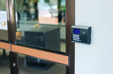 Security door card scan in soft light