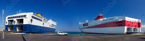 Fotografia Two passenger ferries in harbor, Crete, Greece.