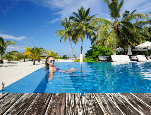 Woman at poolside