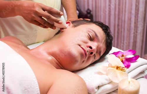 people man engaged in Ayurvedic spa treatment