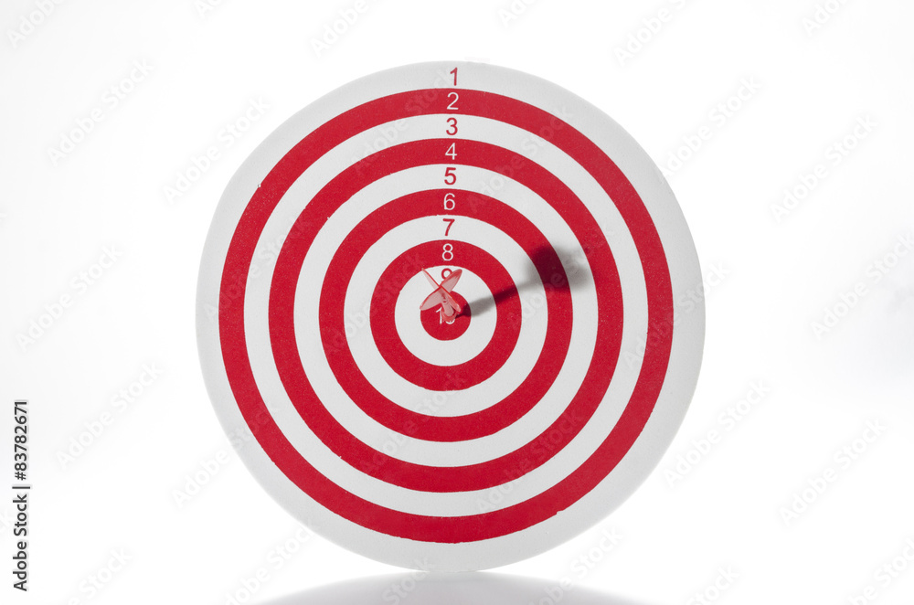 Red target with dart isolated on white background Red target with dart isolated on white background