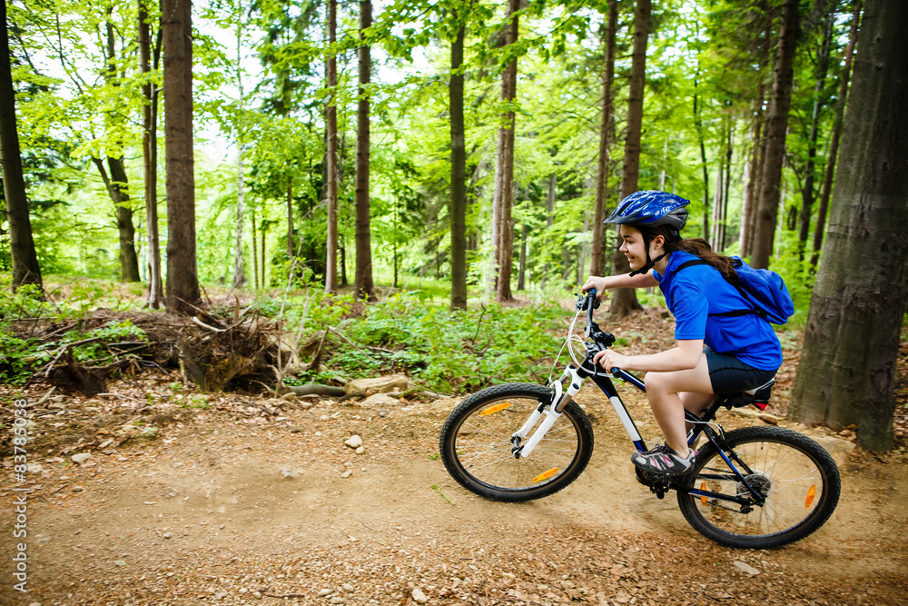 Healthy lifestyle - teenage girl cycling Healthy lifestyle - teenage girl cycling