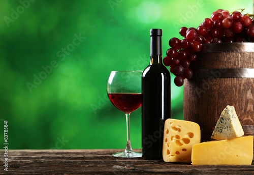 Glass of wine with grapes 