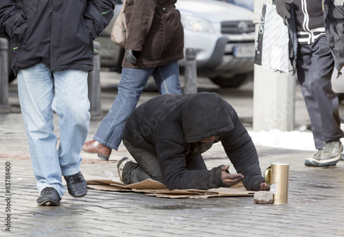 Homeless beggar begging