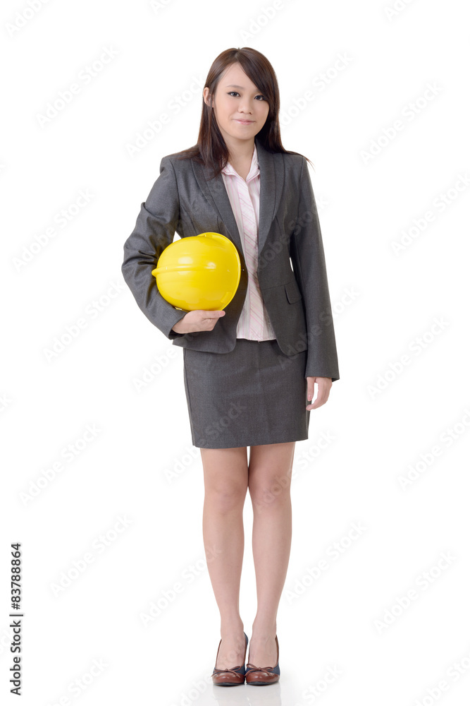 Business woman holding hat