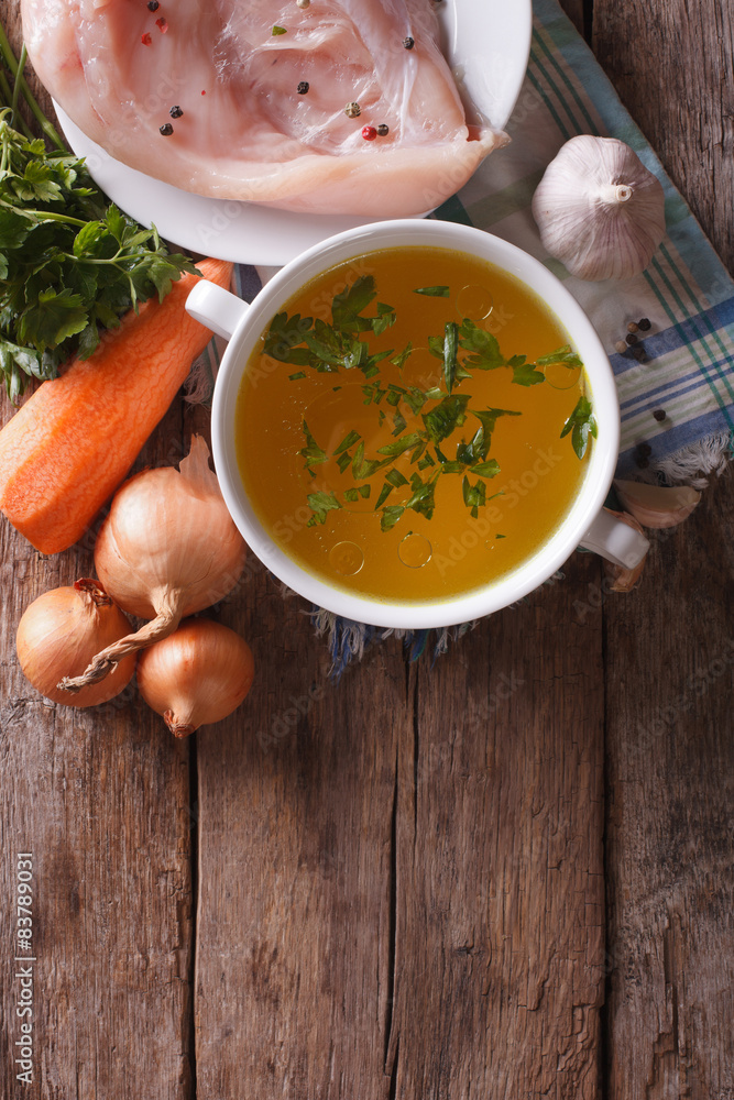 Chicken broth and ingredients. vertical top view, homemade
Chicken broth and ingredients. vertical top view, homemade