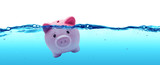 Piggy bank drowning in debt - savings to risk
