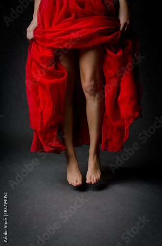 Beautiful legs and red skirt