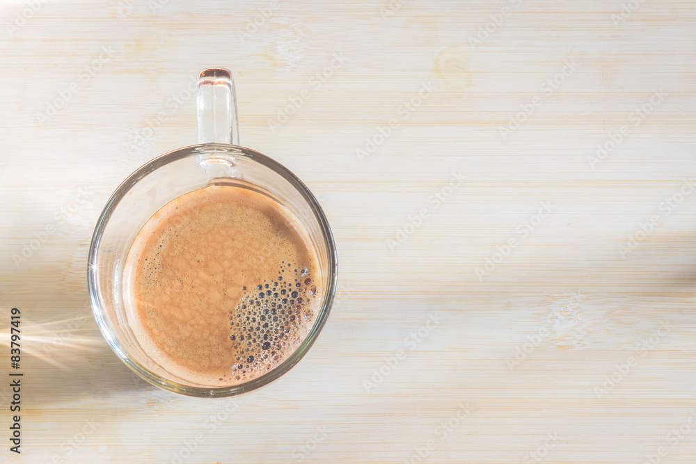 cup of fresh espresso on table, view from above cup of fresh espresso on table, view from above