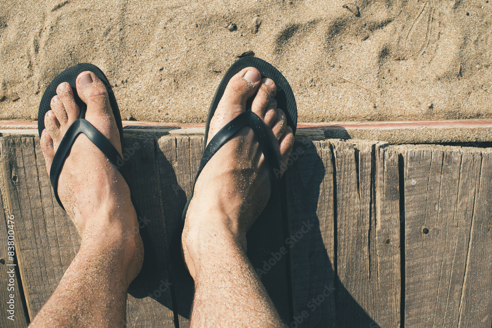 Fototapeta premium Foot in thongs