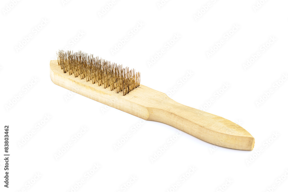 Close-up Brass brush with wooden handle isolated on white Close-up Brass brush with wooden handle isolated on white