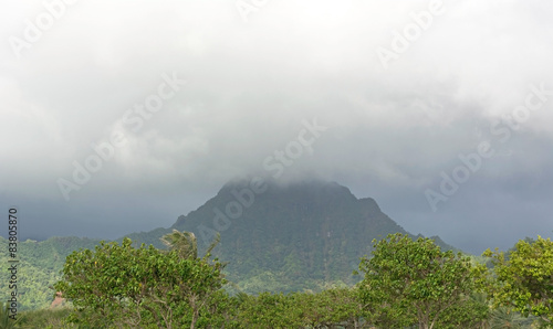 Travel to Hawaii. Mountains at the foggy day photo