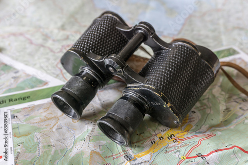 Binoculars and map - route planning 