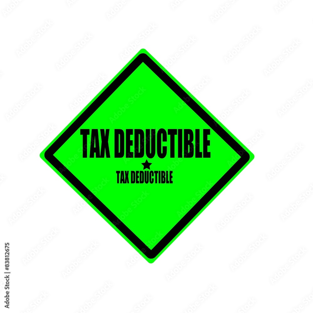 Tax deductible black stamp text on green background Tax deductible black stamp text on green background