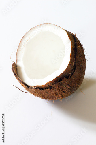 Half a coconut displayed on a white background