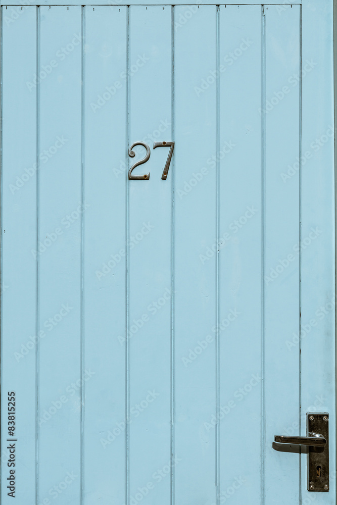 Blue painted weathered door number 27 twenety seven Blue painted weathered door number 27 twenety seven