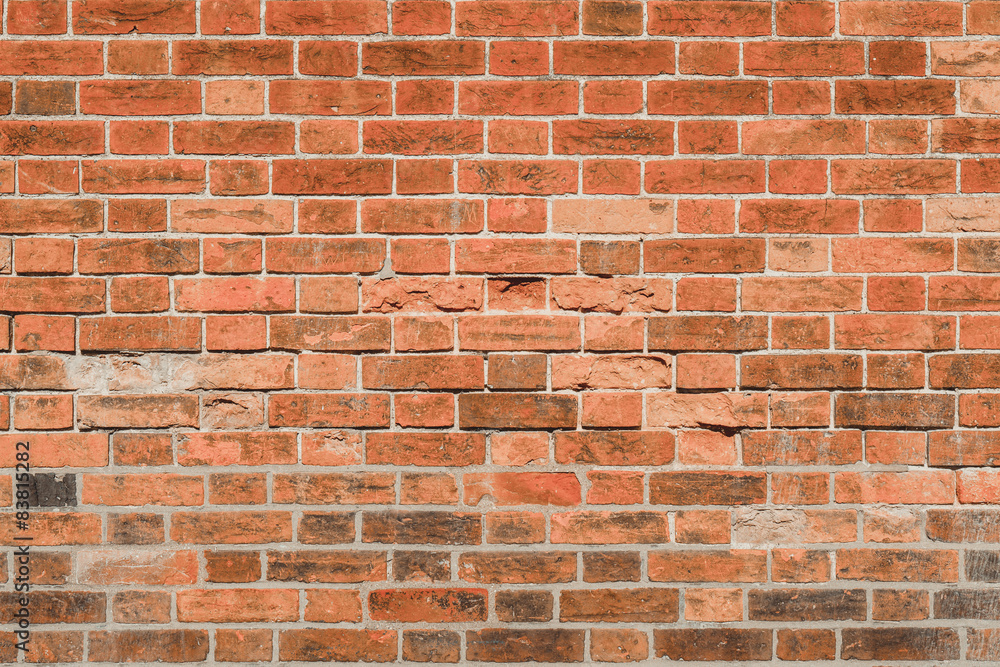 Weathered brick wall closeup Weathered brick wall closeup