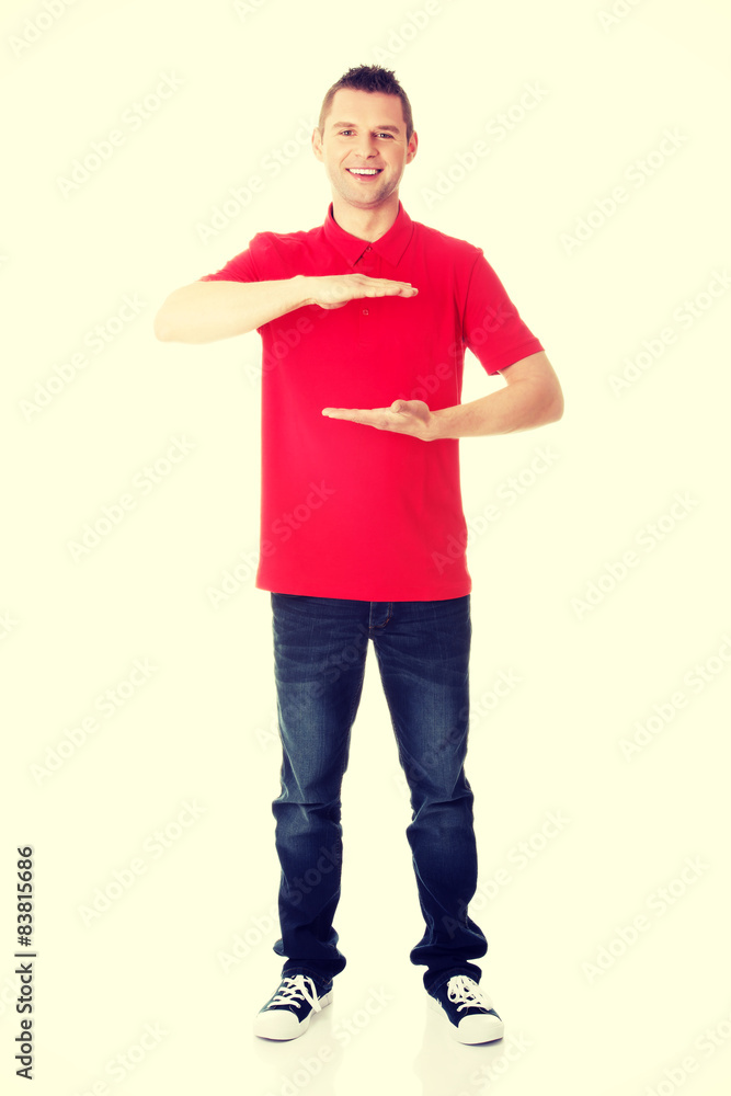Excited man showing copy space Excited man showing copy space