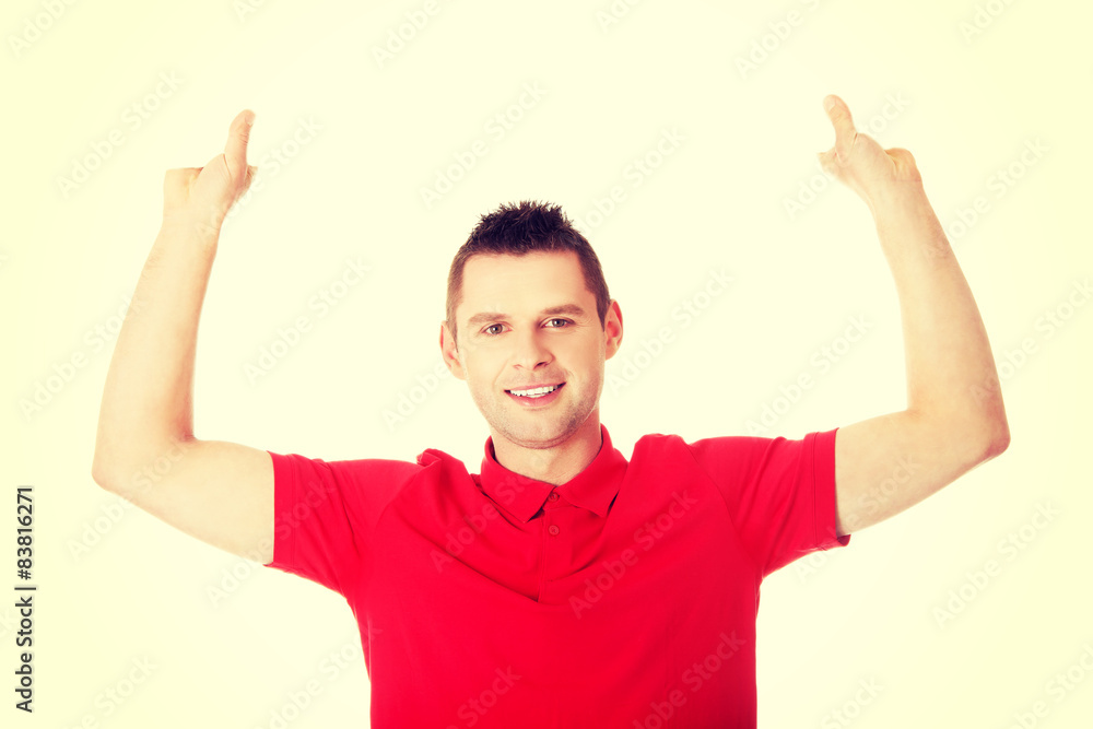 Happy man showing and displaying placard Happy man showing and displaying placard