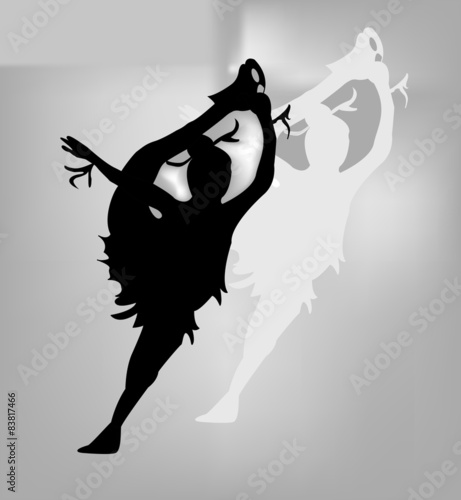 A young  ice skater girl silhouette on a grey background