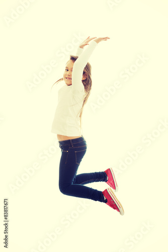 Girl jumping with joy photo