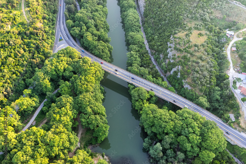Aerial view of the bridge and the road over the river Pinios in Aerial view of the bridge and the road over the river Pinios in