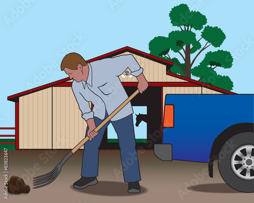 Rancher using pitchfork to clean up after his horse