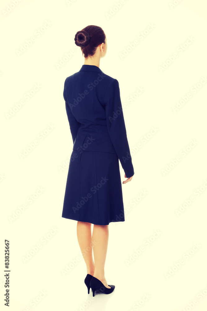 Businesswoman standing back