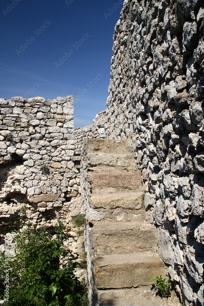 The stone stairs and the walls of the ancient fortress