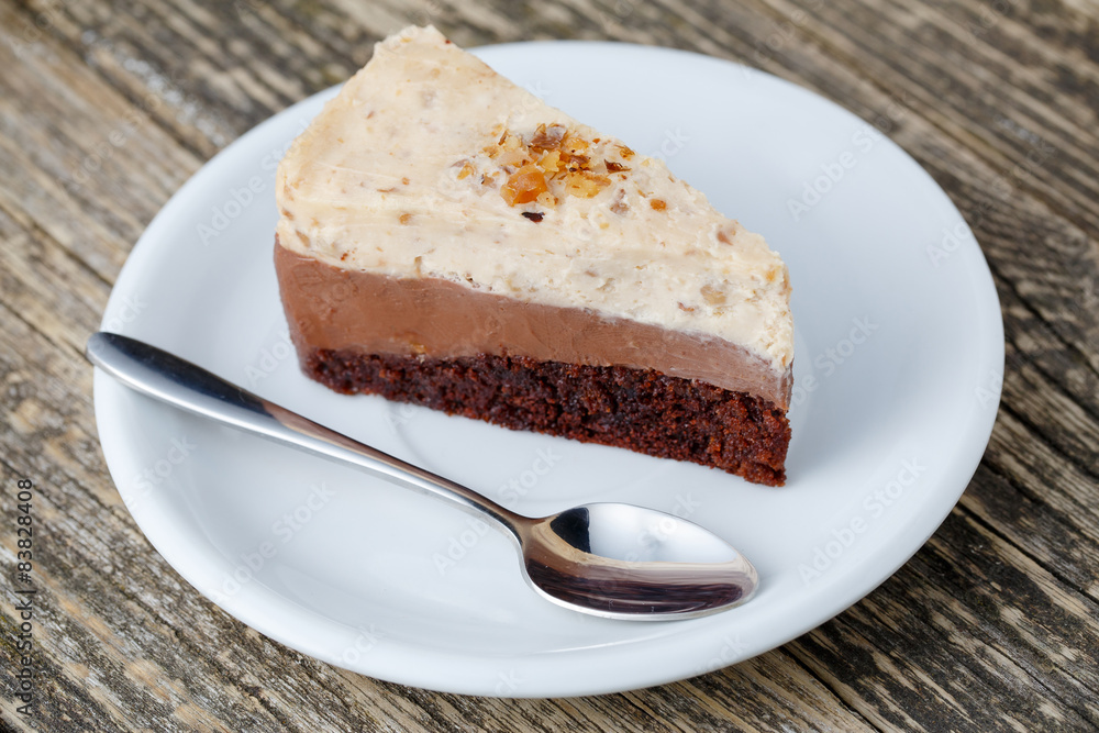Tasty nuts cake on wooden background. Tasty nuts cake on wooden background.