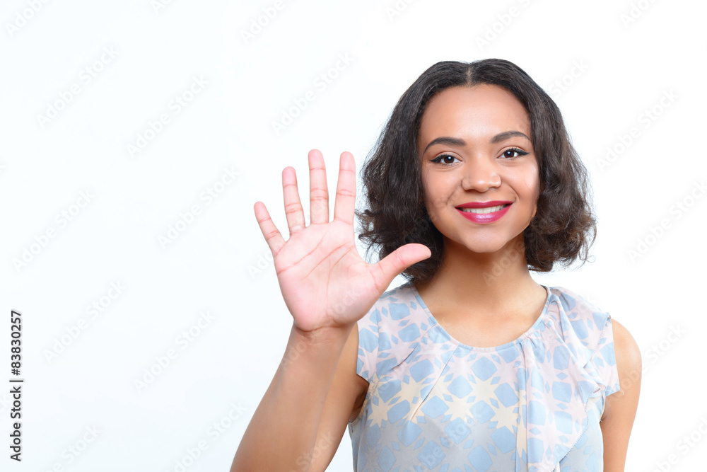 Beautiful girl standing with palm up Beautiful girl standing with palm up