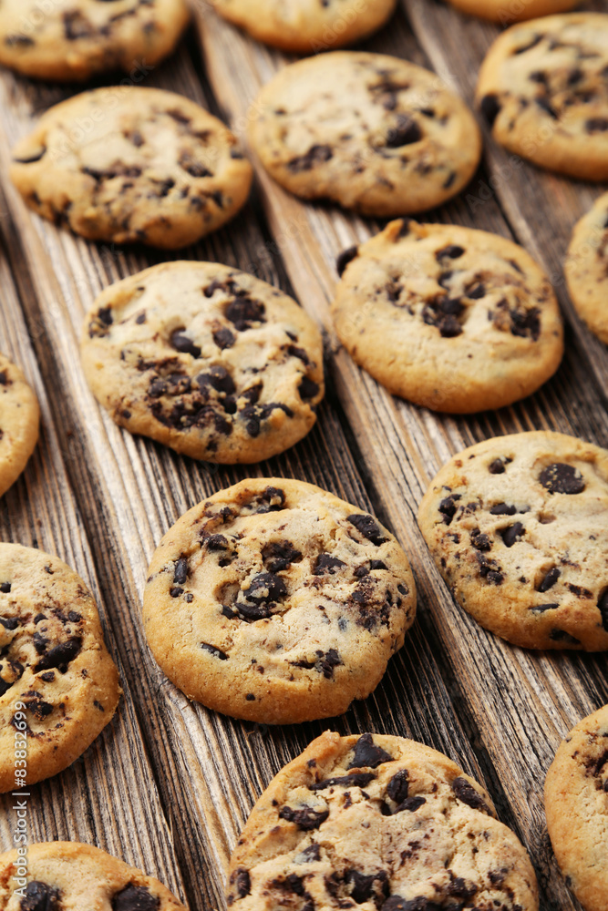 Chocolate chip cookies on brown wooden background Chocolate chip cookies on brown wooden background