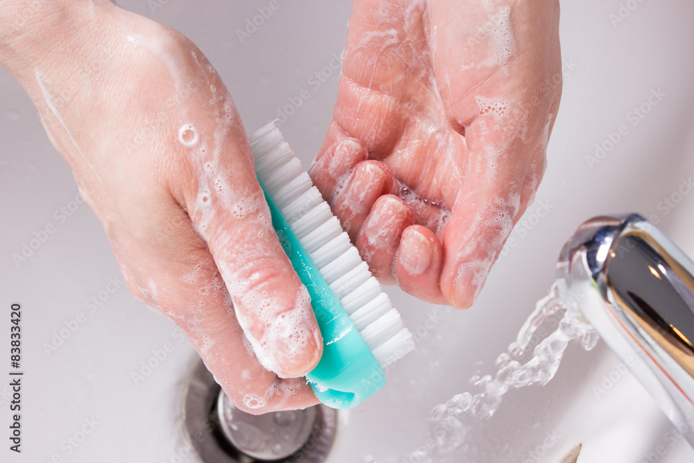 Fototapeta premium woman washing her hands