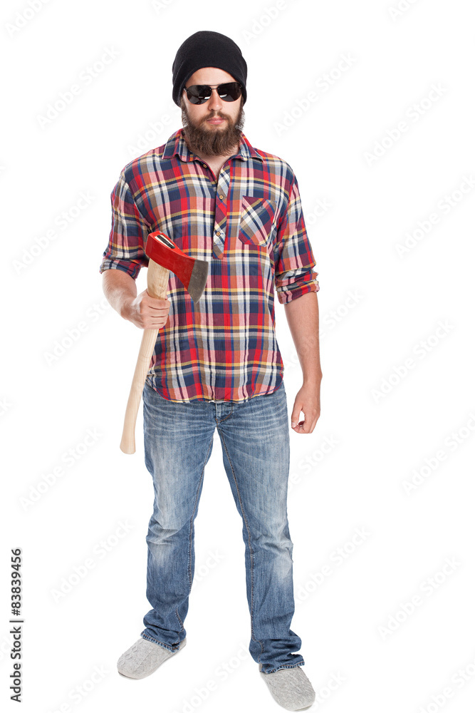 young bearded lumberjack posing with ax young bearded lumberjack posing with ax