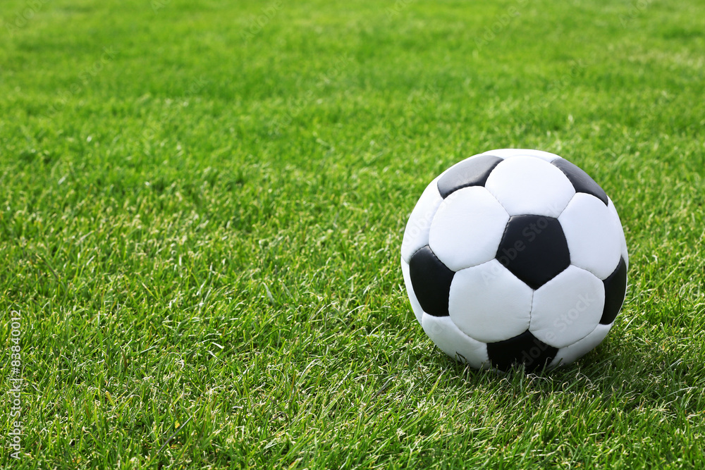 Soccer ball on green field Soccer ball on green field