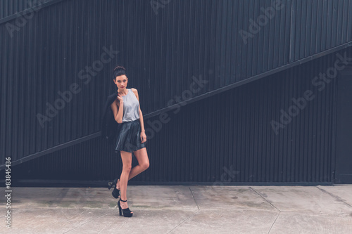 Beautiful girl posing in an urban context © tinx