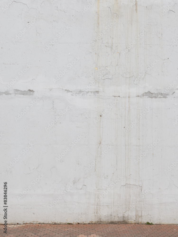 Fototapeta premium old peeling white wall and tiled floor
